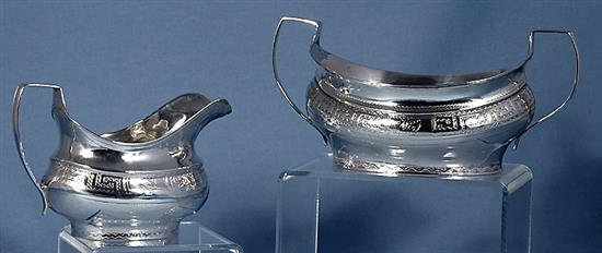 A George III Irish silver sugar bowl and cream jug, maker possibly Robert Breading, bowl length 210mm, weight 12oz/375grms.